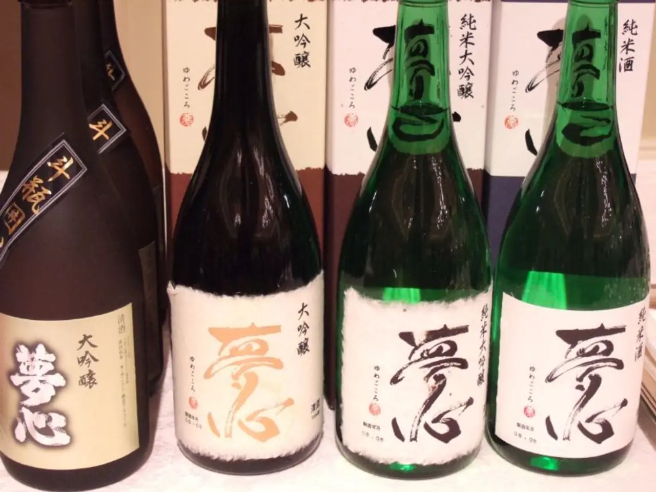 In this image I can see wine bottles.