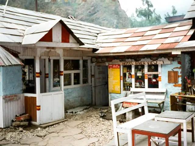 In this image it seems like their is a old house in the foreground and in the background their is...