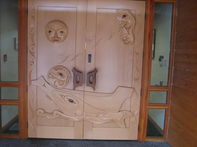 In this image I can see few doors in the centre and on it I can see designs. I can also see few...